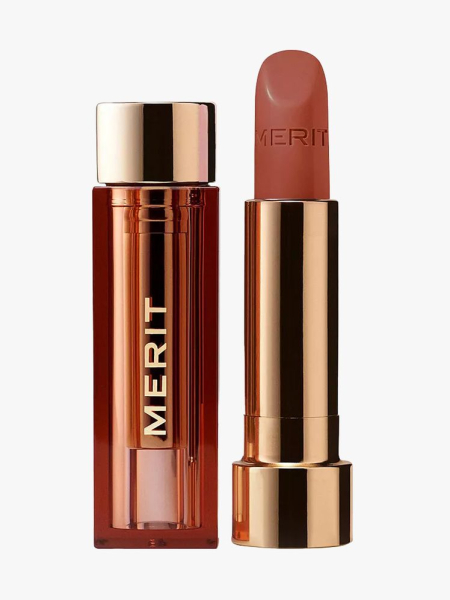 Merit Signature Lipstick in branded component on a light gray background